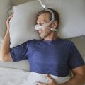 Man-Sleeping-Philips-Respironics-DreamWisp-Nasal-CPAP-Mask_600x600_crop_center@2x