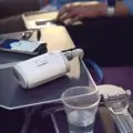 sleep-apnea-travel-cpap-airmini-on-airplane-tray-table-full-photo-1024x741