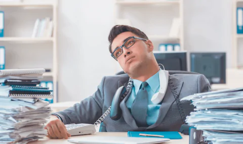 Tired employee in the office